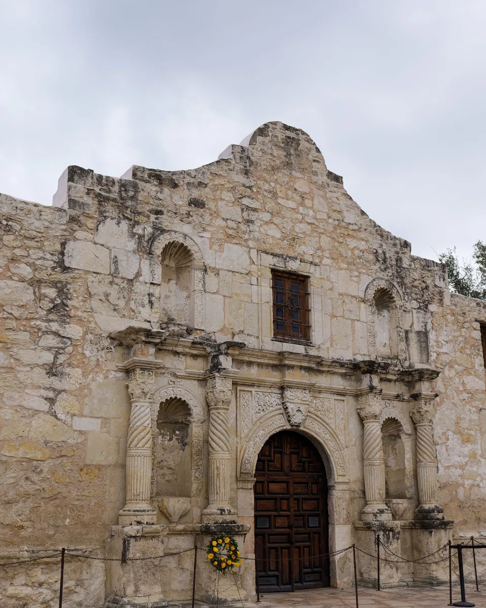 Stone facade of the Alamo mission in San Antonio, TX